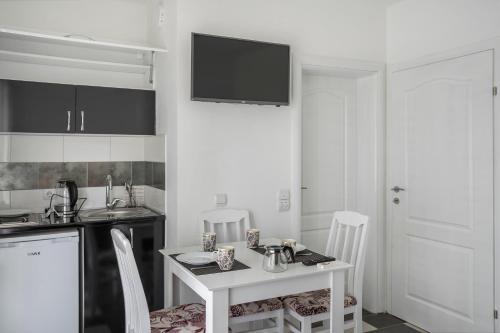 Кухня или мини-кухня в Apartments Natali
