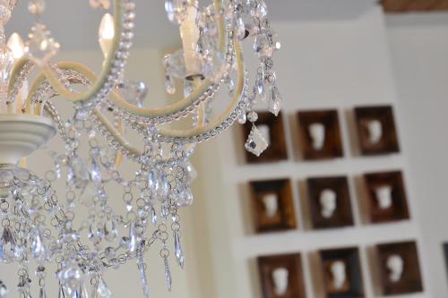 a close up of a chandelier in a room at Hotel Domspitzen in Cologne