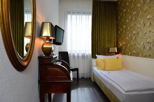Кровать или кровати в номере Hotel Domspitzen