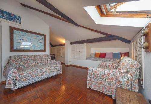 Ένα ή περισσότερα κρεβάτια σε δωμάτιο στο Casa Costanza
