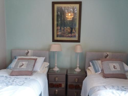 A bed or beds in a room at Gorse Grove Kirby Hill - B&B 