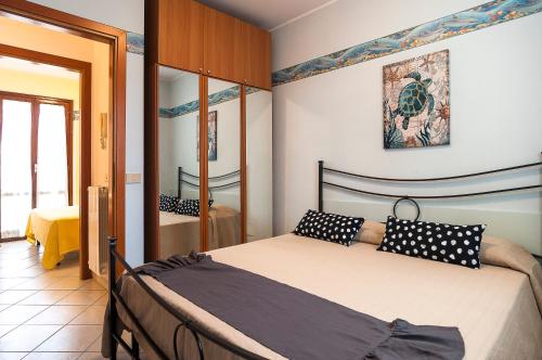 Postel nebo postele na pokoji v ubytování Casa Vacanza Minerva