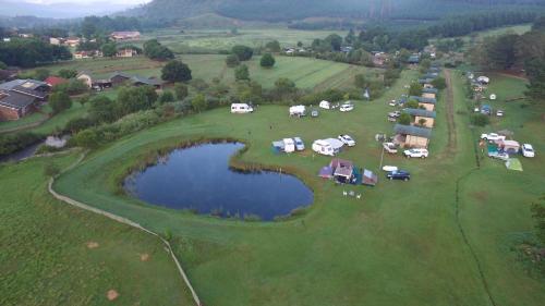 an aerial view of a group of tents on a golf course at Sabie River Camp in Sabie