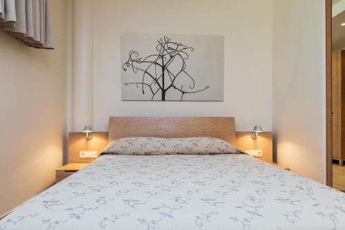 Ένα ή περισσότερα κρεβάτια σε δωμάτιο στο Apartamentai Tylios pušys