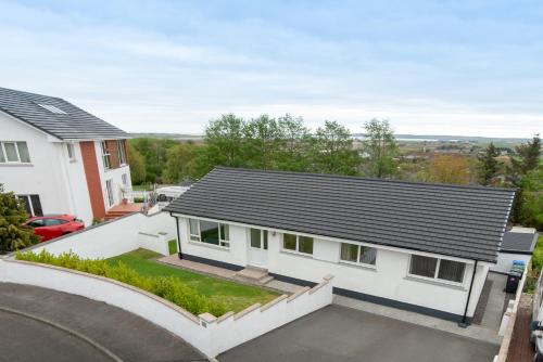 an aerial view of a house with a roof at No. Three in Stornoway