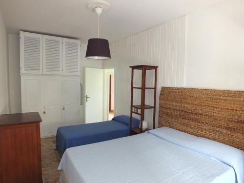 A bed or beds in a room at Villa Mattera