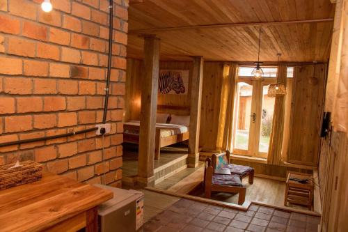Postel nebo postele na pokoji v ubytování Nile Front Cottages