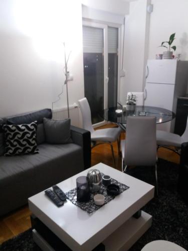 Posezení v ubytování Jasna Apartman