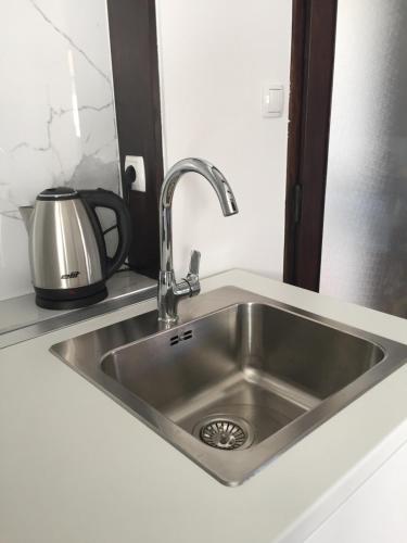 Kuchyňa alebo kuchynka v ubytovaní Apartman studio SONAS 3 with free private parking