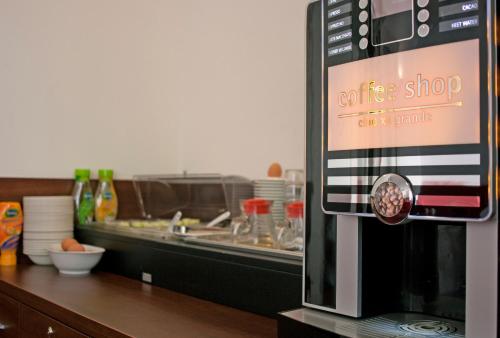 a coffee shop appliance on a counter in a kitchen at Hotel Allure in Amsterdam