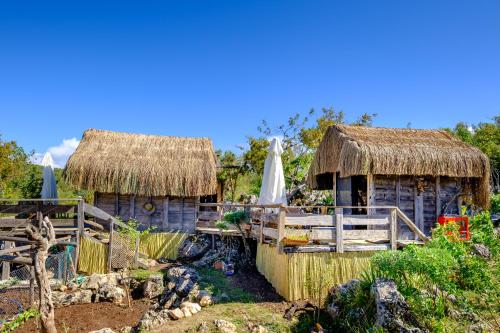 a group of huts with umbrellas at 3 Oda Kaş in Kas