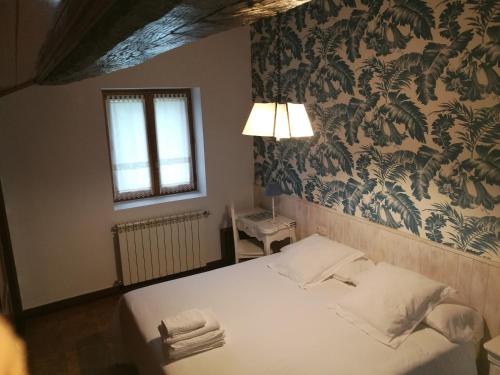Llit o llits en una habitació de Casa Rural Altzibar-berri