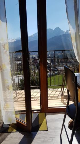 Γενική θέα στο βουνό ή θέα στο βουνό από  αυτό το δωμάτιο σε οικογενειακή κατοικία