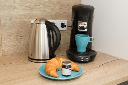 Kemudahan buat kopi dan teh di @home Boardinghouse