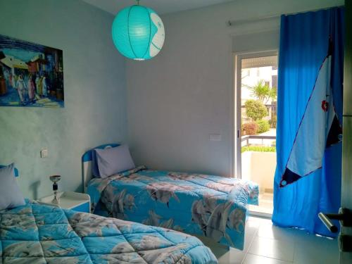 Appartement 9 - Bahia Golf Beach 객실 침대
