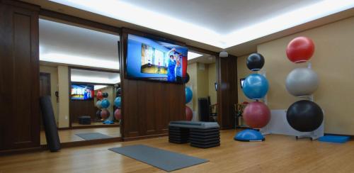 a room with balloons and a flat screen tv at Inn By the Sea in Cape Elizabeth