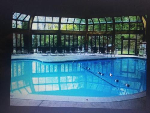 a large swimming pool in a large building at 106 Village at Camelback in Tannersville