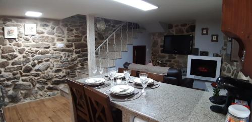 Köök või kööginurk majutusasutuses A Casiña Vella