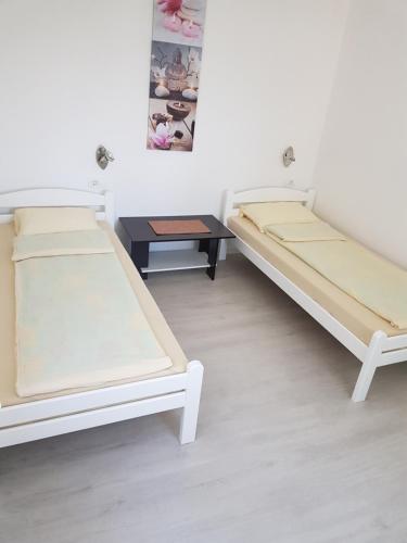 Voodi või voodid majutusasutuse Apartman Nekić toas