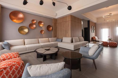 a living room with a couch and a table at Buluba-Green Fields in Yuanshan