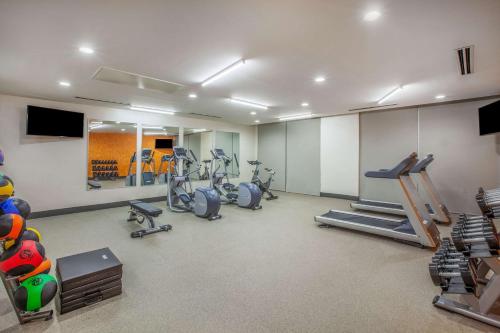 a gym with several exercise bikes in a room at La Quinta by Wyndham Dallas Duncanville in Duncanville