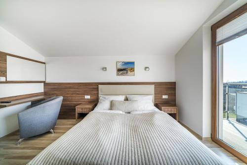 Postel nebo postele na pokoji v ubytování Apartamenty i Pokoje Gościnne Relax