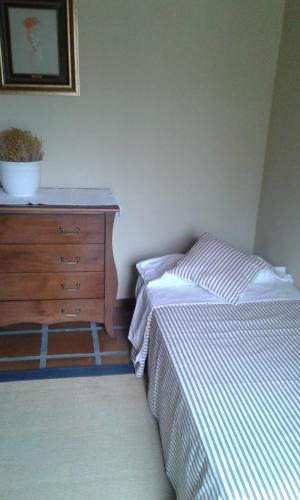מיטה או מיטות בחדר ב-Casa Rural en un Paraje Natural