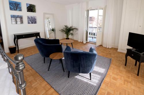 TV a/nebo společenská místnost v ubytování Habsburg B&B