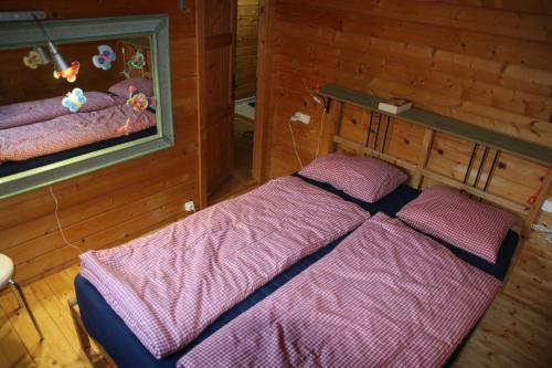 En eller flere senge i et værelse på Finca Mariposa Mariposaholidays