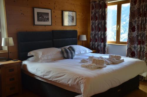 Postel nebo postele na pokoji v ubytování Chalet Morville