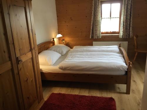 Кровать или кровати в номере Haus Sonnleitn
