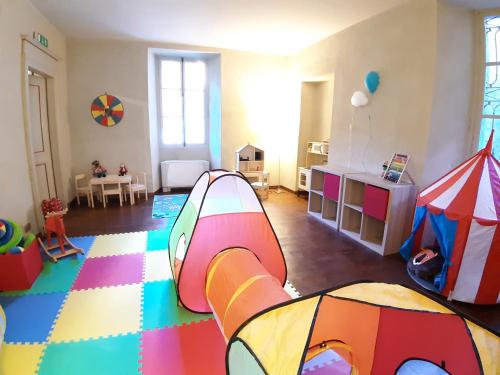 a room with a play room with a play tent at Villa Ottocento in Campertogno