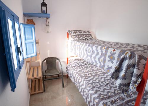 Postel nebo postele na pokoji v ubytování Casa del Capitan
