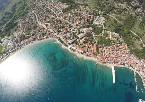 an aerial view of a town next to a beach at Apartman Valdi in Baška