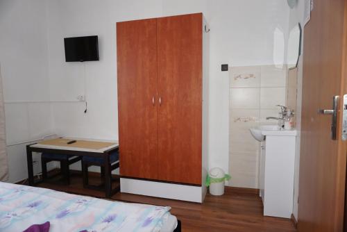 Kuchyň nebo kuchyňský kout v ubytování Hotel Guľa