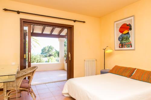 En eller flere senge i et værelse på Sa Rondalla - Formentera