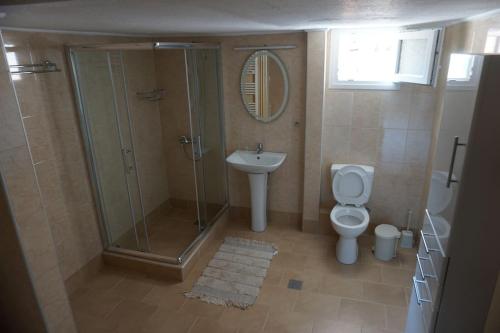 A bathroom at Seaside family Apartment in Paralia Dionisiou