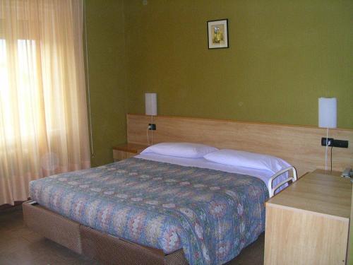 Cama o camas de una habitación en Hotel Milano