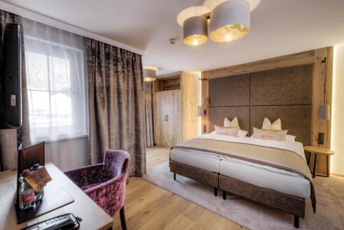 Un ou plusieurs lits dans un hébergement de l'établissement Hotel Brigitte