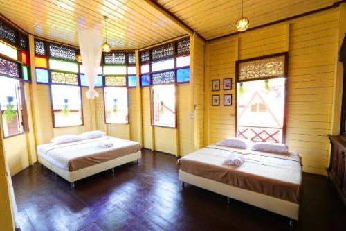 Postel nebo postele na pokoji v ubytování Baankhon Private room in Thai house Check in by yourself code inbox Adult Only