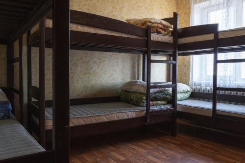 Postel nebo postele na pokoji v ubytování Panorama-hostel