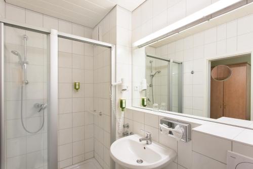 Ett badrum på Hotel Waldesruh