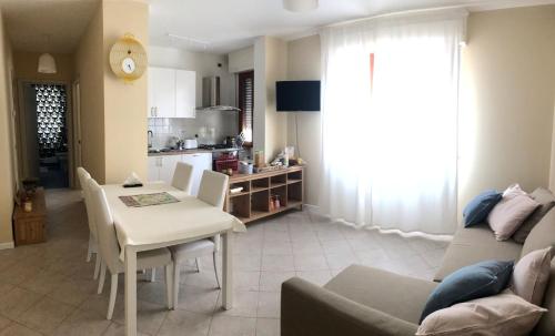 Area soggiorno di La Coccinella Apartment