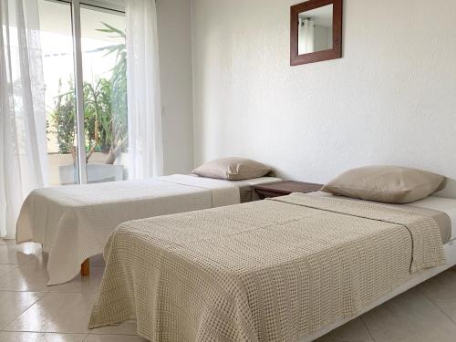 Posteľ alebo postele v izbe v ubytovaní Résidence Panoramer