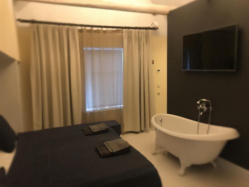TV a/nebo společenská místnost v ubytování Villa Kertelhof Guesthouse