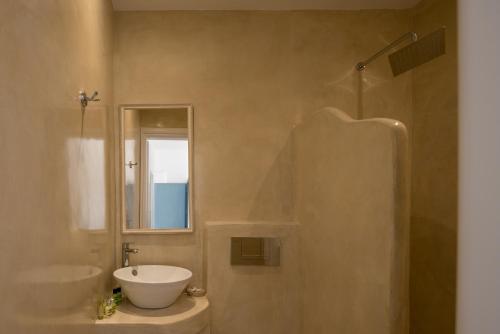 Ванная комната в Caldera Romantica Hotel