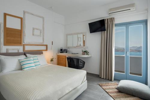 Posteľ alebo postele v izbe v ubytovaní Caldera Romantica Hotel
