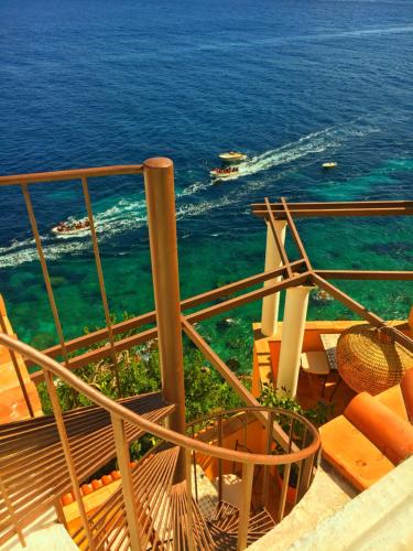 a view of the ocean from a balcony at La Terrazza sul Mare in Capri