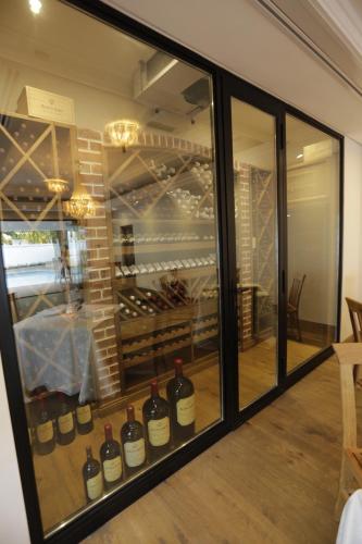 a display window of a wine cellar with wine bottles at The Giglio Boutique Hotel at Zevenster in Johannesburg