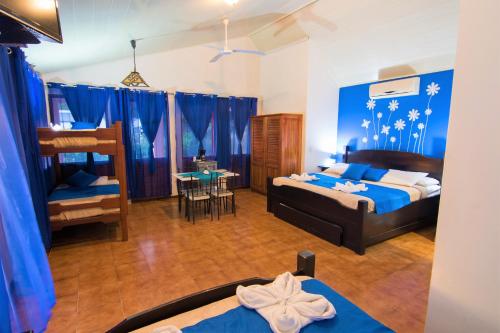 En eller flere senger på et rom på Adventure Park & Hotel Vista Golfo